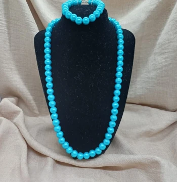 Collar y pulsera de perlas color aqua
