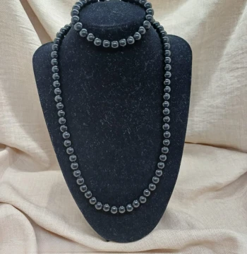 Collar y pulsera de cuentas tipo perlas negras