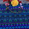 Güipil Kem Textiles, fondo: negro con figuras color verde y azules (Luto)