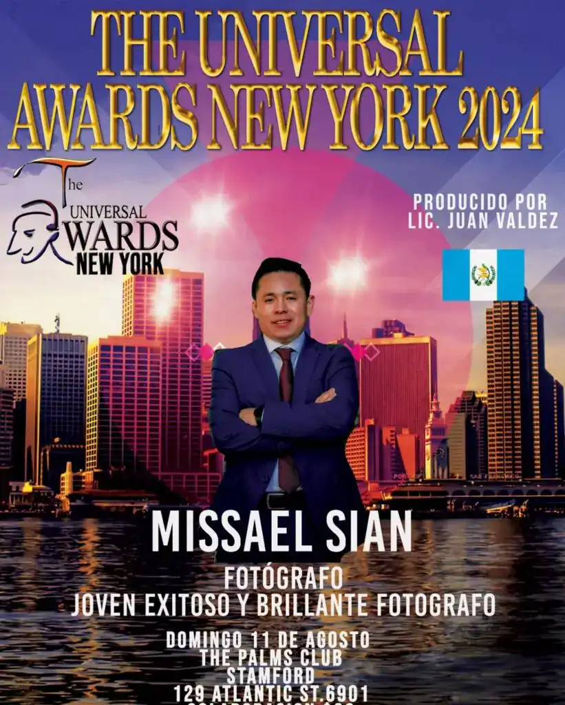 Imagen de la portada de la revista SoyMigrante.com REVISTA destacando al joven fotógrafo Misael Sian en el evento de los Universal Awards New York 2024, con fondo de la ciudad de Nueva York y banderas. – SoyMigrante.com REVISTA