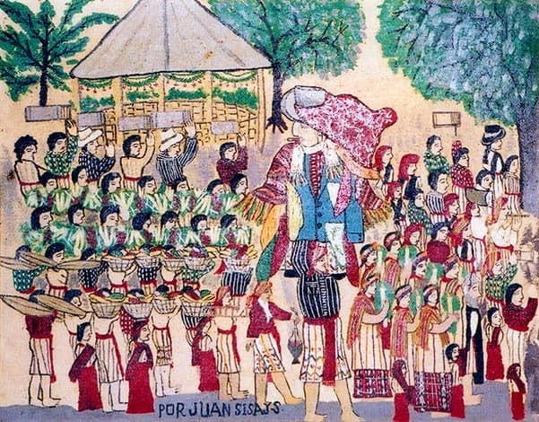 Juan Sisay fue autodidacta y nunca dejó de aprender. Aunque no se guíaba por las reglas tradicionales o académicas, su obra está llena de luz, autenticidad y de una visión afectuosa hacia la cultura tzutujil. (Pintura de Juan Sisay, cuya firma aparece en la obra) – SoyMigrante.com REVISTA