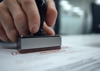 stamping a document in a immigration tramit 1