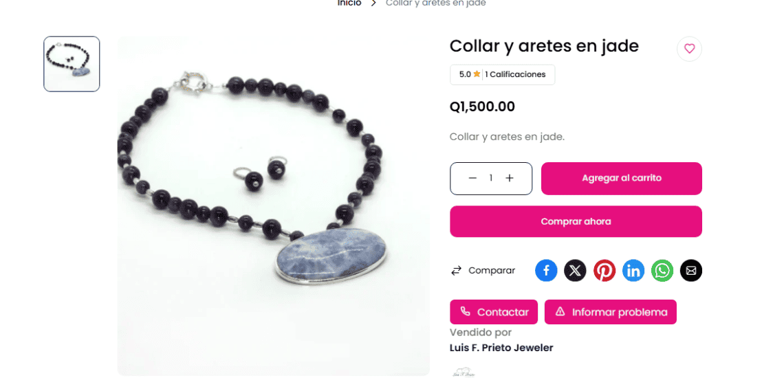 Beaded necklace with dark purple jade beads and a large oval blue-gray jade pendant on white background, product photo.