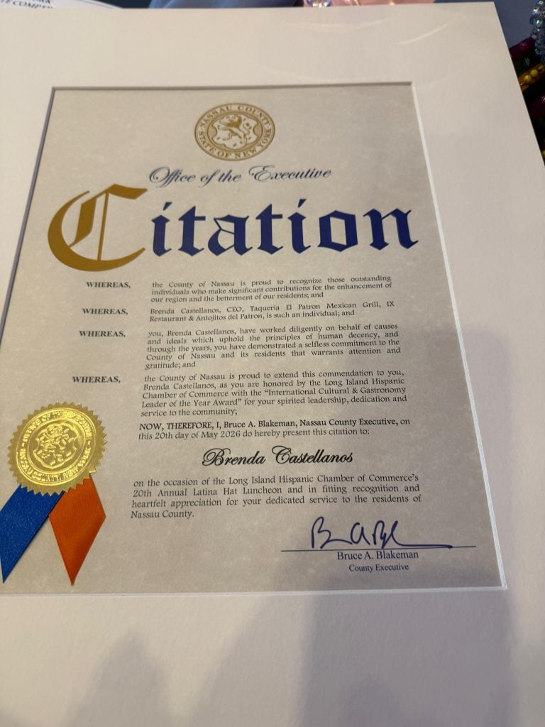 Formal certificate titled 'Citation' from the Office of the Executive, featuring a gold seal and blue ribbon with a signature area at the bottom.