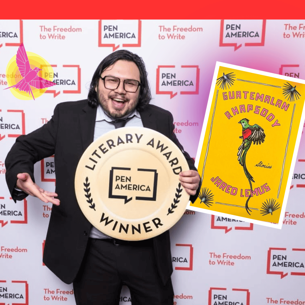 Smiling man in a suit holding a large circular 'Literary Award Winner' plaque with the Pen America logo; backdrop features 'The Freedom to Write'.